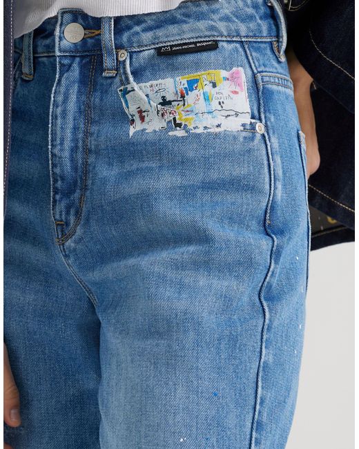 X jean-michel basquiat - capsule - jean droit - délavage moyen Lee Jeans en coloris Blue