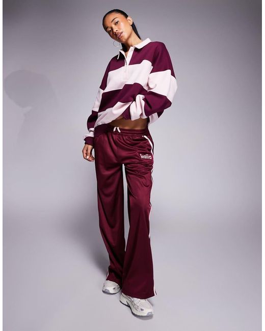 Joggers De Pernera Ancha Con Raya Lateral Y Logo Bordado De Tricot De (Parte De Un Conjunto) Kaiia de color Purple