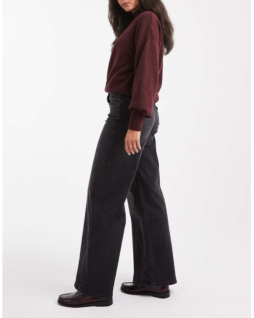 Vaqueros Negro Lavado De Talle Alto Y Pernera Ancha Elástica 728 De Levi's de color Black