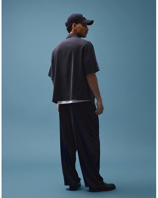 Bershka Blue Fluid Super baggy Darted Trousers for men