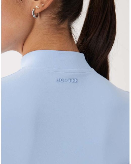 BO+TEE Blue Bo+tee Quarter Zip Short Sleeve Sports Top
