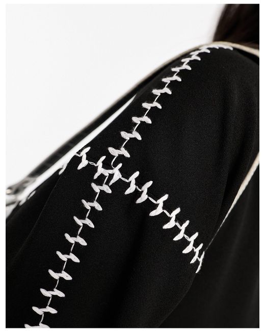 Pull oversize à surpiqûres contrastantes - et blanc Vero Moda en coloris Black