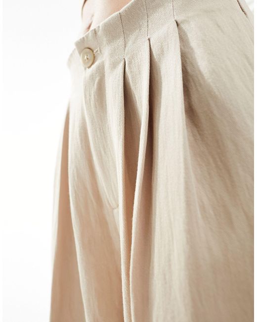 Pantalon plissé ample ajustée - caramel Stradivarius en coloris Natural