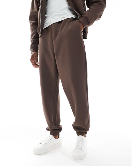 ASOS – essentials – oversize-jogginghose in Brown für Herren
