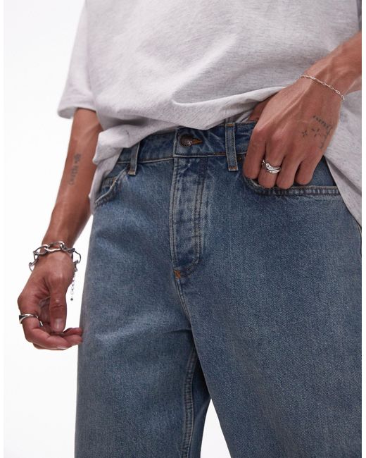 Jeans affusolati lavaggio medio vintage di Topman in Blue da Uomo
