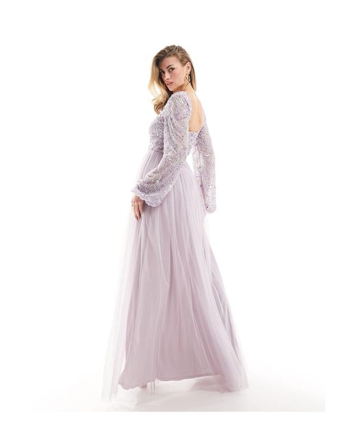 L'invitée - robe longue et ornementée à manches longues - lilas Beauut en coloris Purple