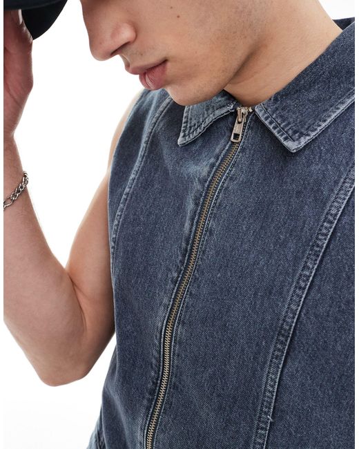 Exclusivité asos - - combinaison en jean sans manches avec fermeture éclair - délavé Calvin Klein en coloris Blue
