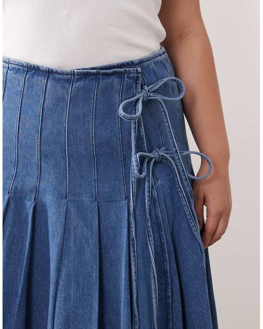 ARRANGE Blue Curve Pleated Denim Midi Skirt With Tie Detail