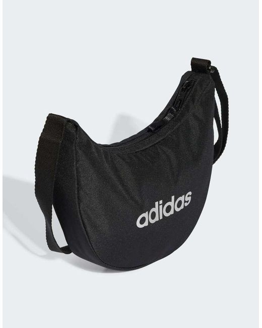 Linear Essentials di Adidas Originals in Black