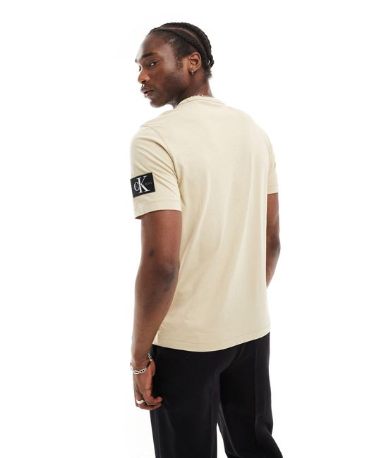 T-shirt beige con logo di Calvin Klein in Natural da Uomo