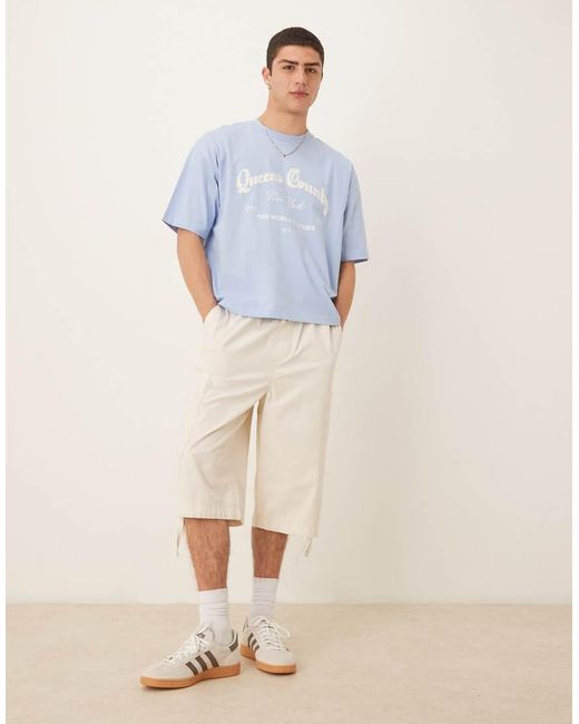 Camiseta Azul Claro De Corte Cuadrado Extragrande Con Bordado De Ciudad De ASOS de hombre de color Blue