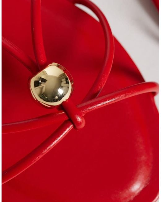 Glamorous Red Flat Sandals With Gold Detail