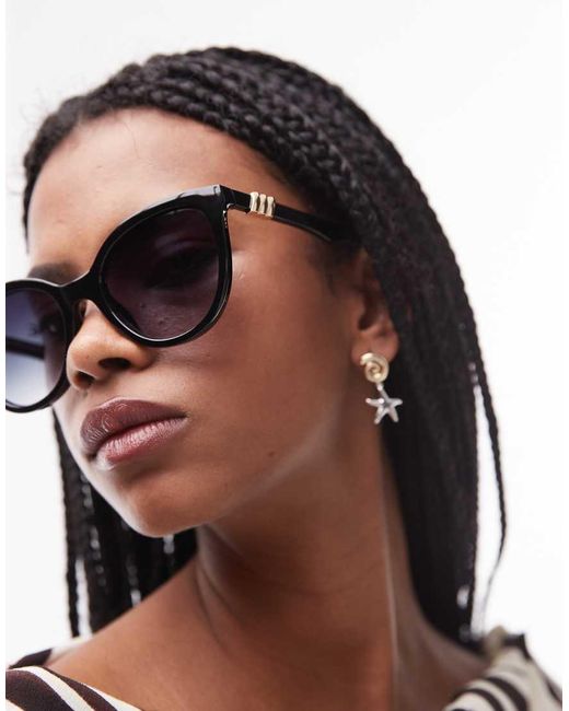 The Muse di Le Specs in Brown