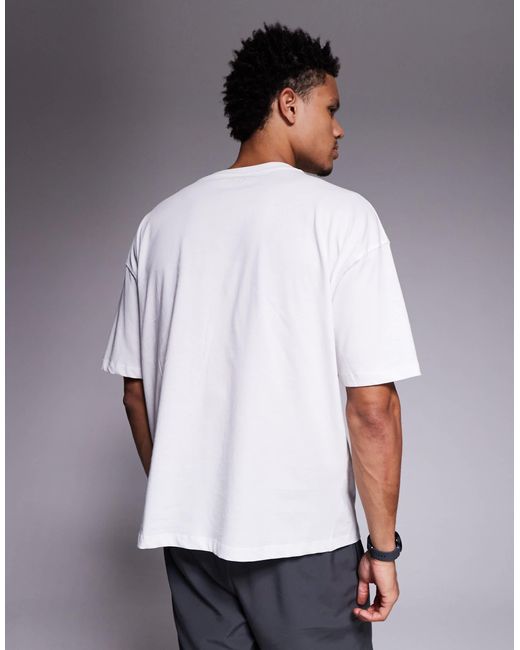 4505 – icon – schnell trocknendes oversize-trainings-t-shirt in White für Herren
