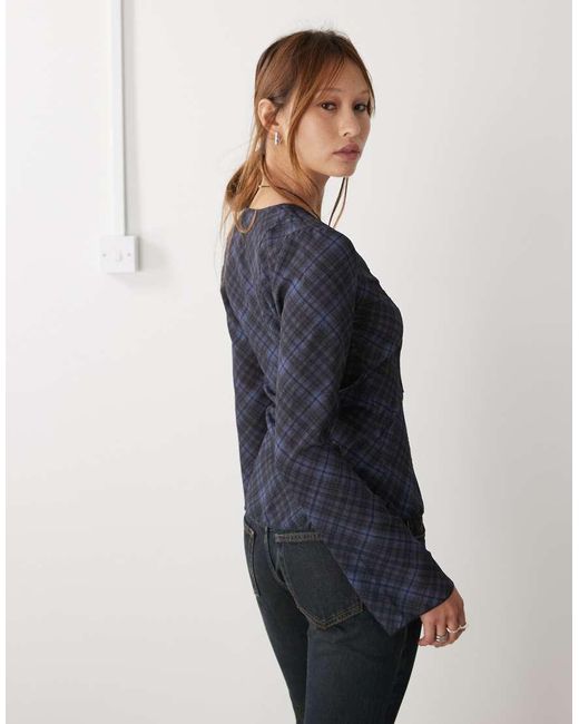 Blusa Negra A Cuadros Con Lazada Delantera Y Mangas Vaporosas Scorpio De Weekday de color Blue