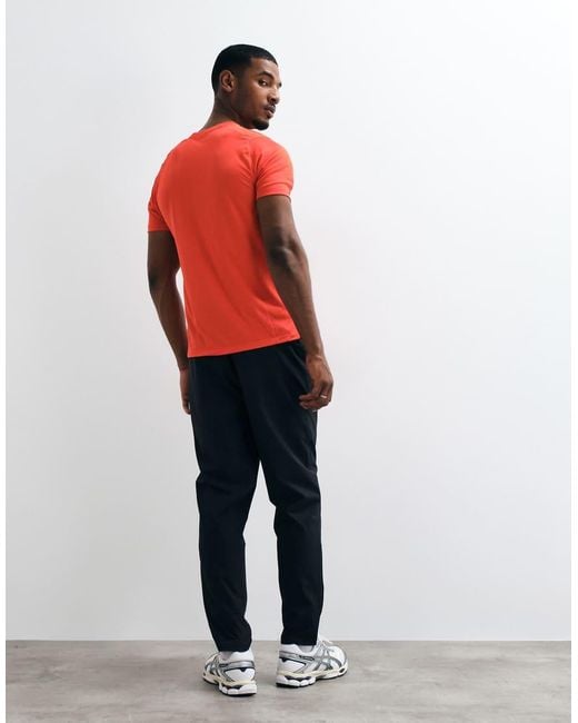 New Balance Red Utility Stretch Woven Pant for men