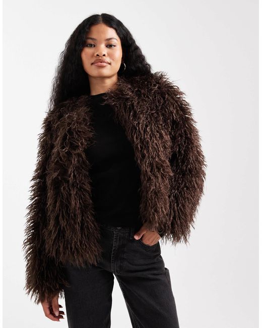 Veste en fausse fourrure à poils longs - marron New Look en coloris Black