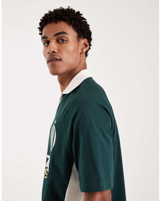 ASOS Green Relaxed Polo T-Shirt With Panels And Football Graphic for men