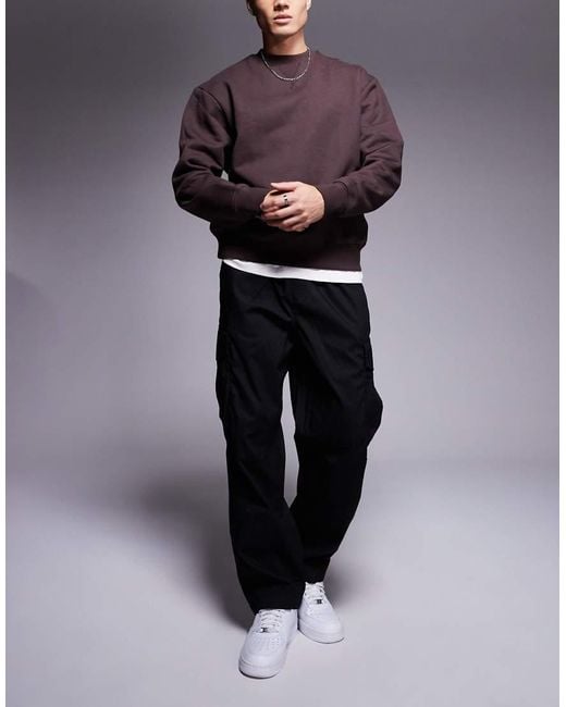 ADPT Black Tapered Balloon Fit Cargo for men