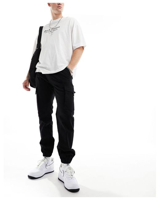 Criminal Damage White Cuffed Leg Cargo Pants With Side Leg Army Pockets for men