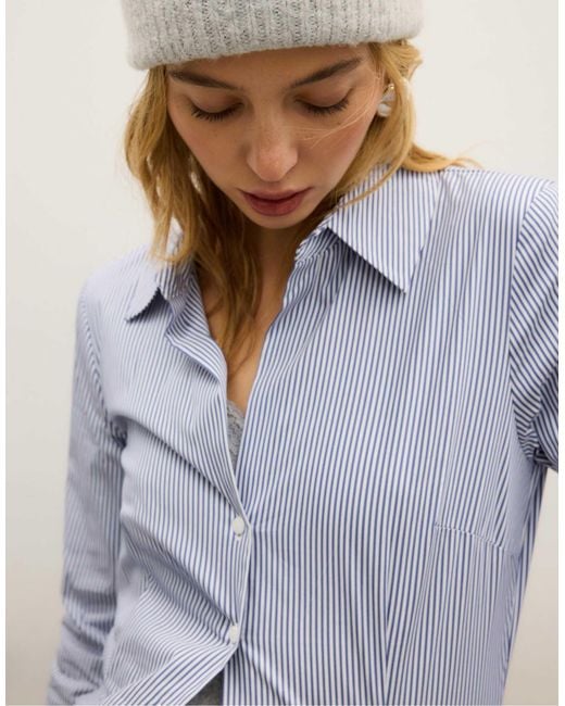 Stradivarius Blue – figurbetonte basic-hemdbluse