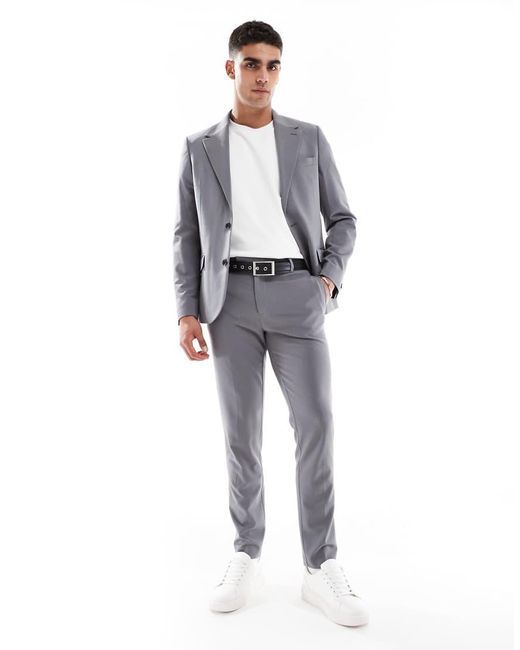 Chaqueta De Traje Entallada De Tejido Elástico En Cuatro Direcciones De ASOS de hombre de color Blue