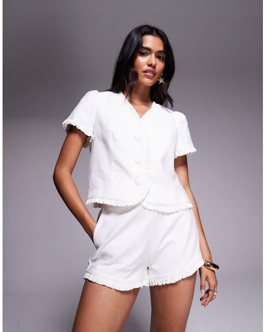 Short d'ensemble aspect lin à volants River Island en coloris White
