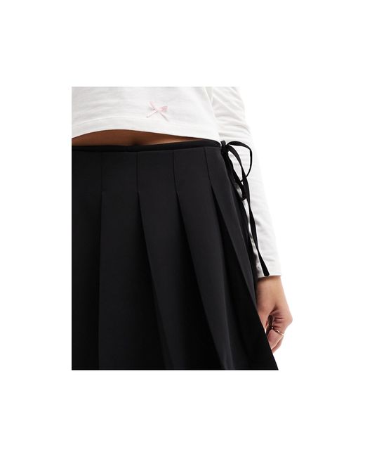Minifalda pantalón negra cruzada y plisada Miss Selfridge de color Black