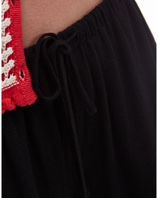 Pantalon d'ensemble ultra ample en lin naturel TOPSHOP en coloris Black