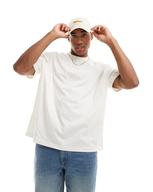 T-shirt oversize à imprimé chérubin sur la colonne ASOS pour homme en coloris White