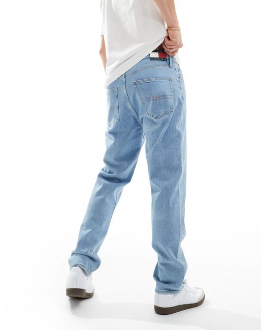 Jeans dad fit affusolati regular fit lavaggio medio di Tommy Hilfiger in Blue da Uomo