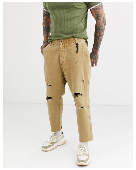 Bershka Denim Smaltoelopende Losvallende Jeans Met Scheuren in het Naturel  voor heren | Lyst NL