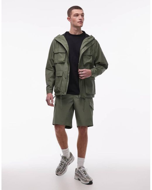 Rains Green 12210 Pocket Waterproof Cargo Hooded Jacket for men