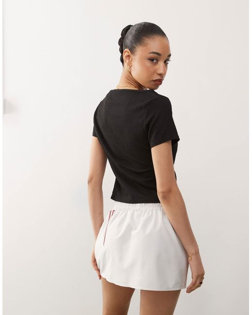 Reclaimed (vintage) Black Textured Slash Neck Button Through Top