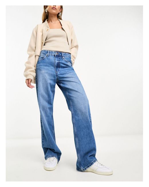 Jeans dritti stile anni '90 lavaggio medio di River Island in Blue