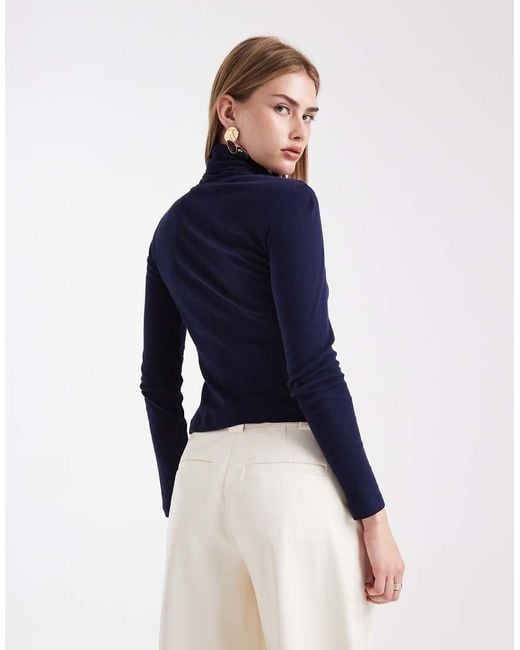 Top Dolcevita Taglio Lungo Blu Trasparente di ASOS in Blue