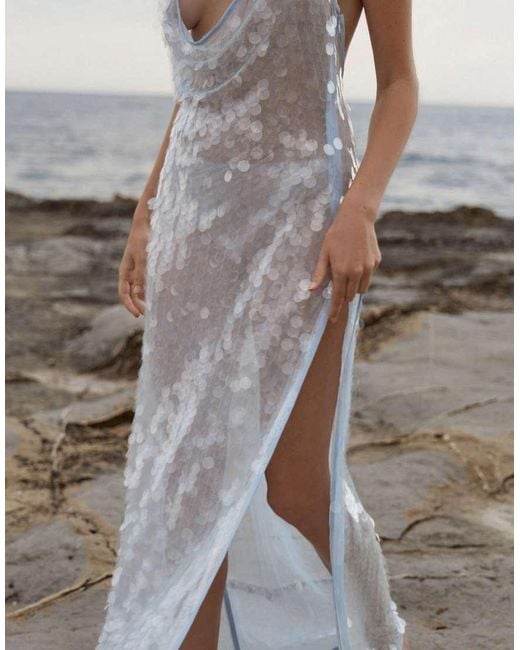 The Frolic White Exclusive Disc Sequin Cowl Neck Thigh Split Low Back Maxi Dress