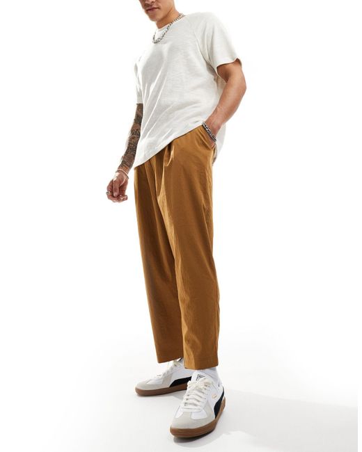 Pantaloni cropped comodi a fondo ampio marroni di Reclaimed (vintage) in White da Uomo