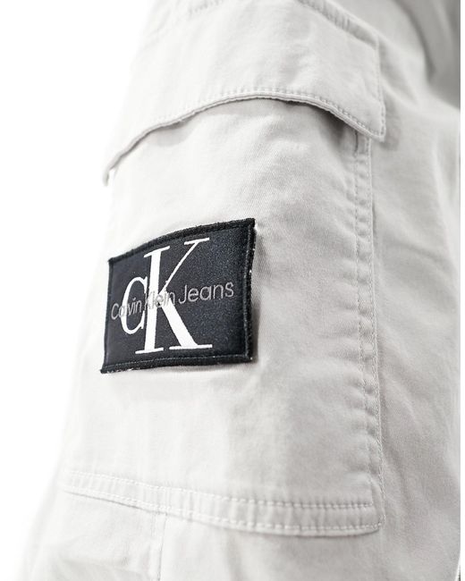 Calvin Klein White Badge Cargo Trousers for men