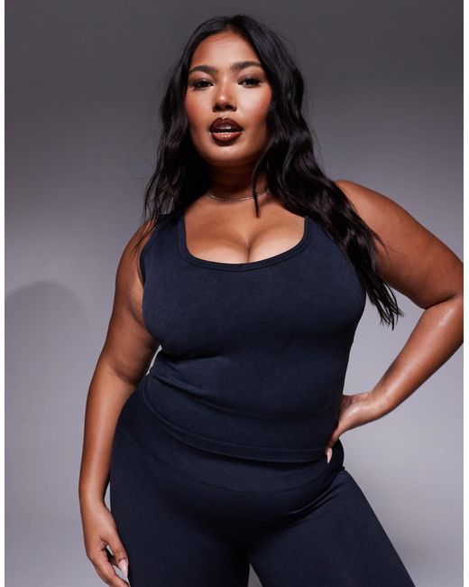 Curve - débardeur sans coutures à col v avec brassière intégrée - délavé 4505 en coloris Blue