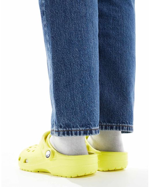 Sabots classiques unisexes - fluo CROCSTM en coloris Blue