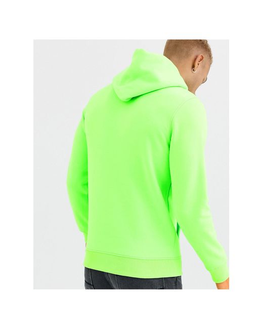 Tommy Hilfiger Hoodie Met Neon Logo Op in het Groen voor heren | Lyst NL