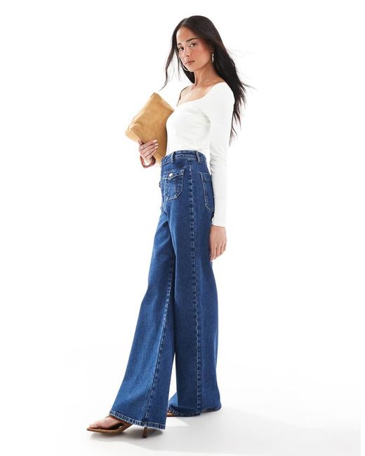 Jeans A Fondo Ampio Medio Scuro Con Tasche Sul Davanti di ASOS in Blue