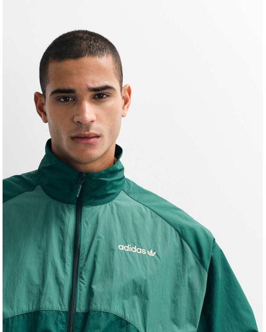 Adidas Originals Green Munich Woven Track Top for men