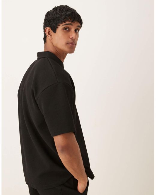 ASOS – oversize-polohemd aus schwerem, strukturiertem material in Black für Herren
