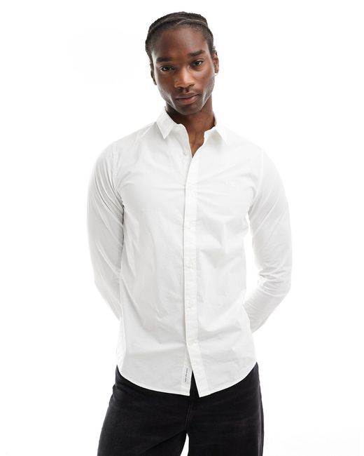 Calvin Klein – stretch-hemd mit schmalem schnitt in White für Herren