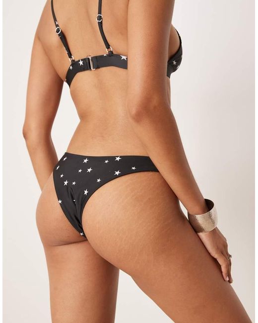 Slip Bikini Neri A V Con Stelle Scintillanti di OOSC in Black