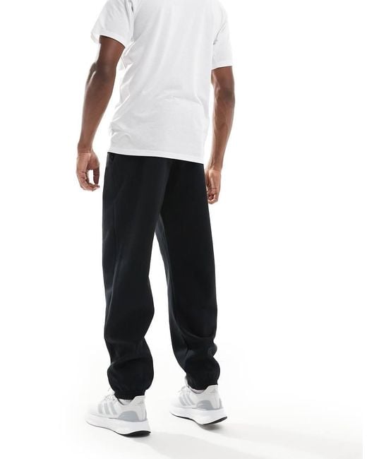 Adidas Originals White Adidas Basketball joggers for men