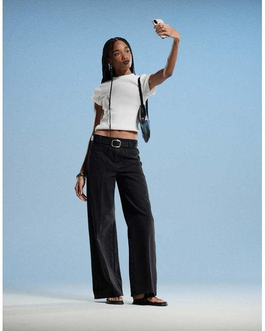 Vaqueros Negros De Pernera Ancha Con Botones Dorados Emma De Mango de color Blue