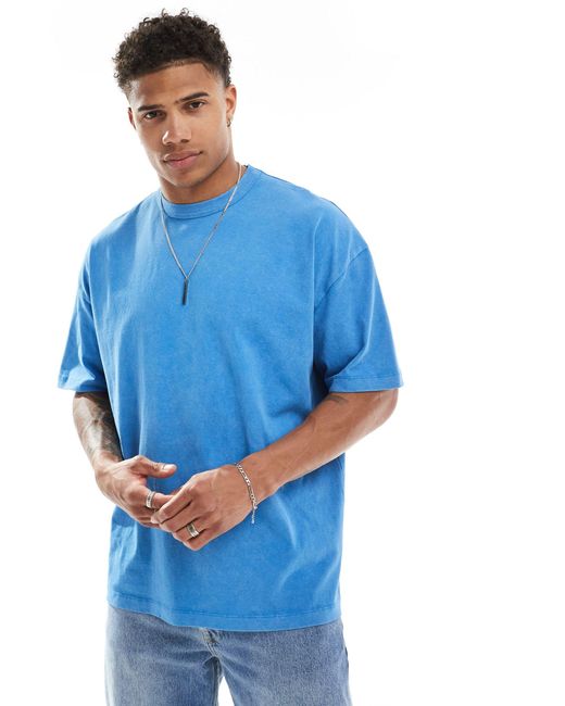 Camiseta azul lavado extragrande con estampado en el centro ASOS de hombre de color Blue